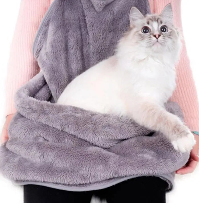 Grey pet out cat carrying bag with sleeping chest apron on a neutral background