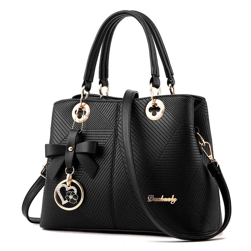 Retro style women's handbag in PU leather with a zipper and adjustable strap in five colour options.