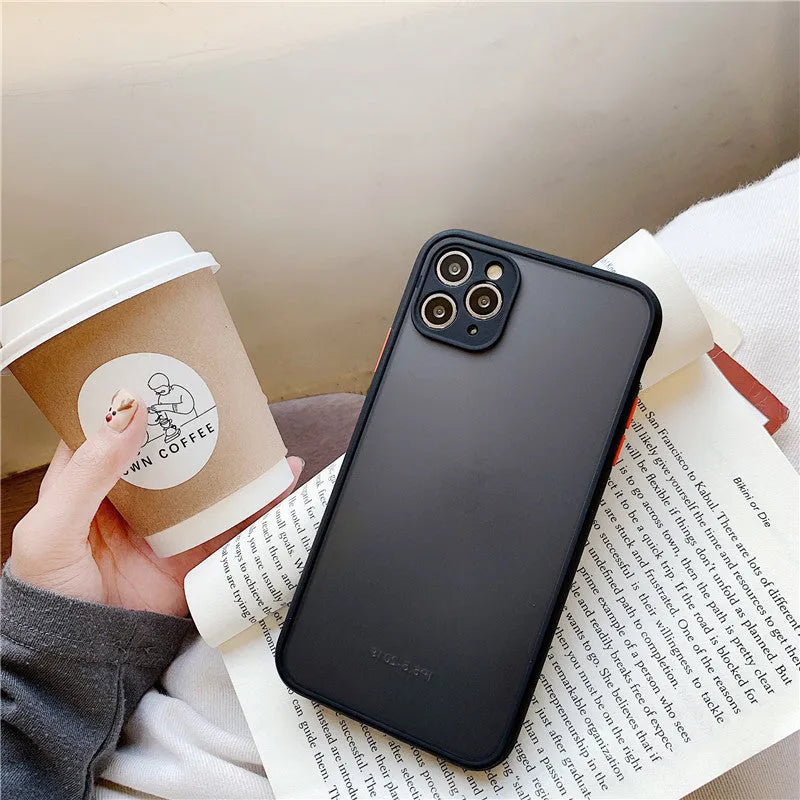Transparent solid-colour shockproof iPhone case showing soft TPU sides and hard PC back, compatible with multiple models.