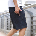 Men's straight-leg cotton trousers in army green colour showing loose fit and summer design