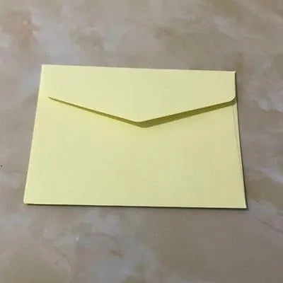 Mini coloured envelopes in assorted colours showing 11.5cm by 8cm dimensions and western-style flap