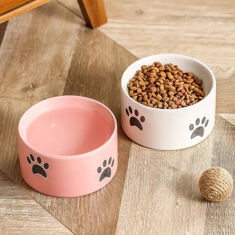 Ceramic cat bowl with high foot design in cat's paw pattern available in multiple colours