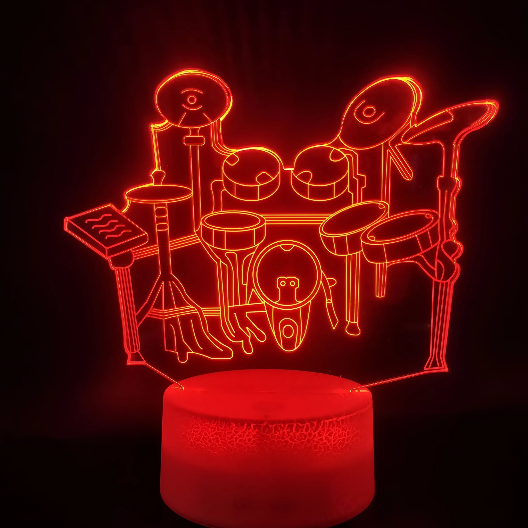 3D acrylic drum kit night light glowing in blue on a black ABS base with remote control.