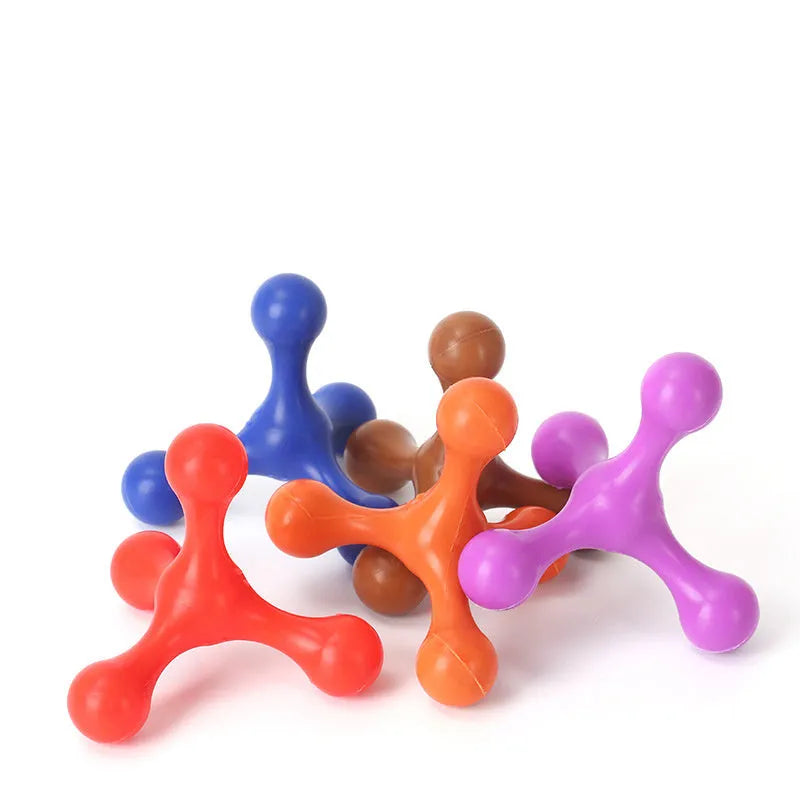 Blue silicone three-legged chew toy for puppies on a white background.