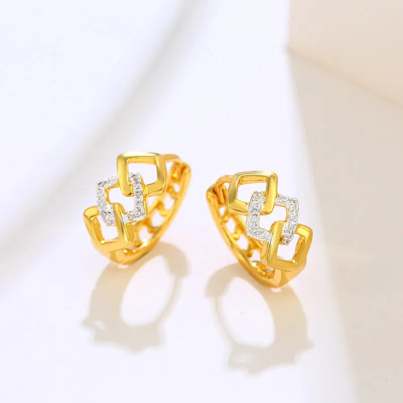 Geometric hollow-out gold electroplated earrings with colour separation design and ear clip fastening