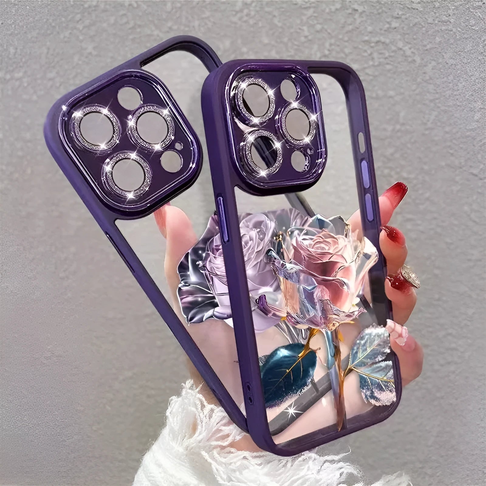 Dark purple TPU iPhone case with fairy rose pattern and integrated sparkling pink camera lens protector film