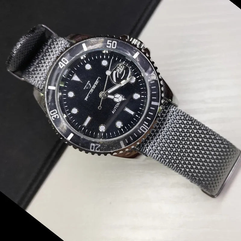 Nylon integrated watch strap in Army Green colour, shown next to Black, Deep Khaki, Light Gray, and Sapphire Blue options.