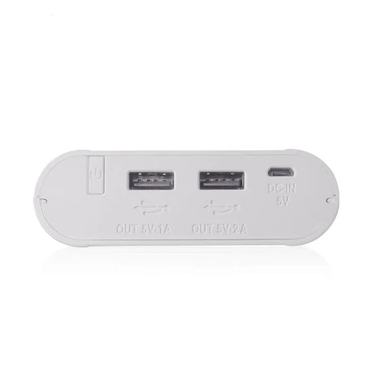 Black and white DIY mobile power bank and 18650 battery charger unit with LCD display.