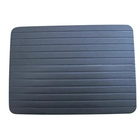 Black aluminium quick defrosting tray for thawing meat and frozen food without electricity.