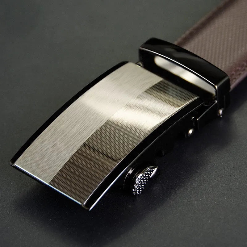Men's cowhide leather belt with automatic rectangular alloy buckle in black on white background