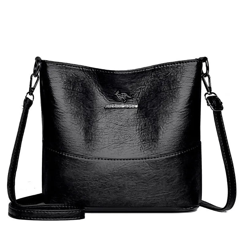 Women's soft leather large capacity shoulder bag in bucket design with internal organisation