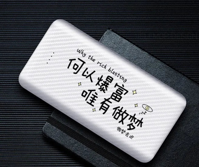 20,000mAh portable power bank showing multiple USB ports and compact dimensions