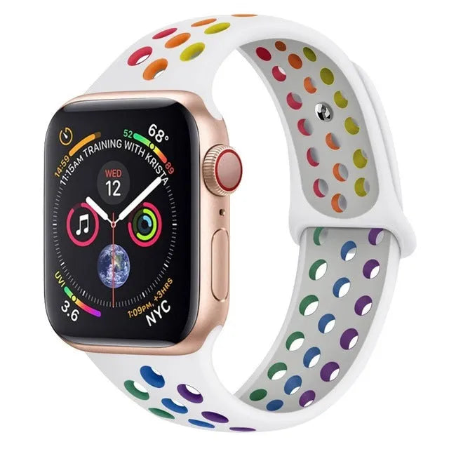 Silicone sports wristband with single buckle in black, rainbow, or white colours showing two size options