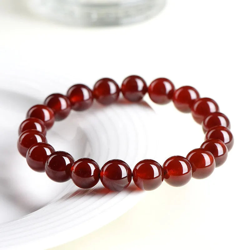 Natural orange red garnet crystal bracelet with ruyi motif in retro unisex design