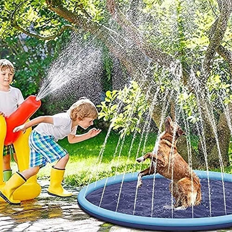 Bright blue inflatable dog splash pad with textured base, shown in a garden setting.