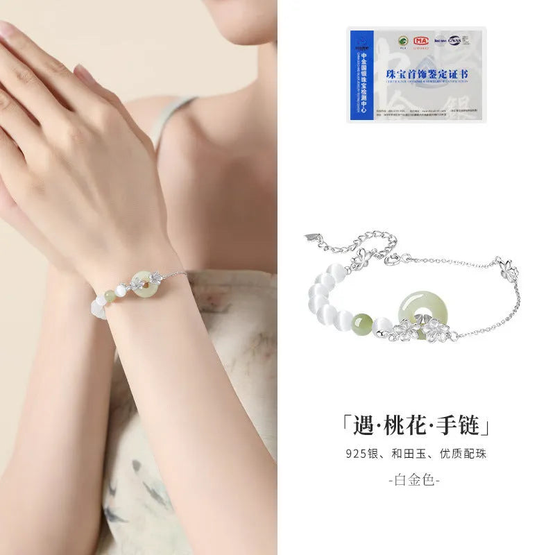 Women's pure silver safety buckle bracelet with peach blossom flower design in New Chinese style