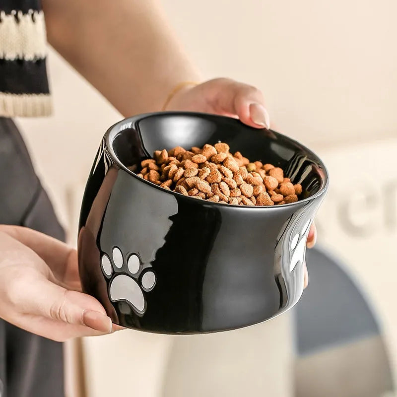 Ceramic cat bowl with high foot design in cat's paw pattern available in multiple colours