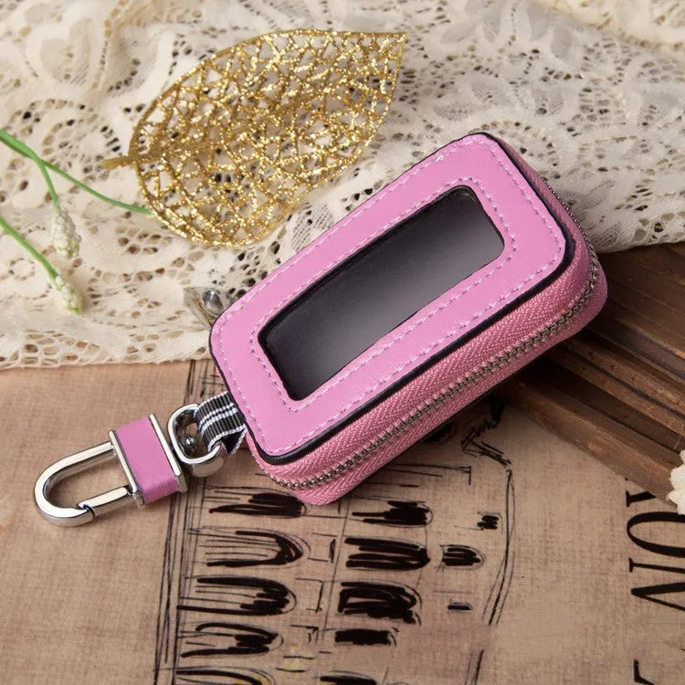 White genuine leather car key case with a plain weave pattern, shown in a square vertical design.