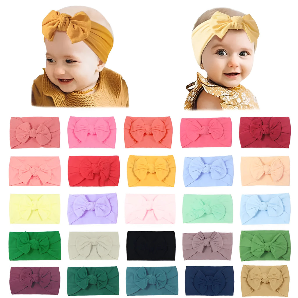 Super stretchy soft knot headband with hair bow for baby girls in one of 22 colours