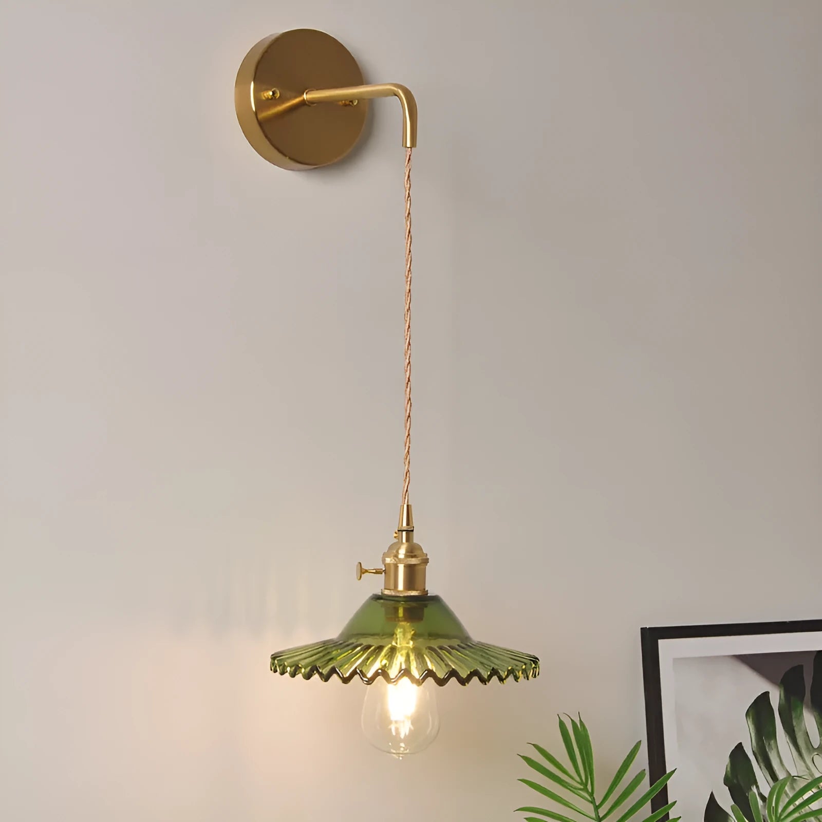 Retro copper Lotus wall lamp with a glass shade in a choice of six colours on a wall.