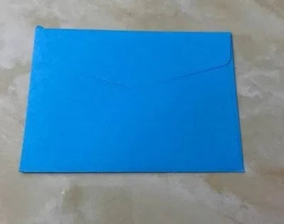 Mini coloured envelopes in assorted colours showing 11.5cm by 8cm dimensions and western-style flap