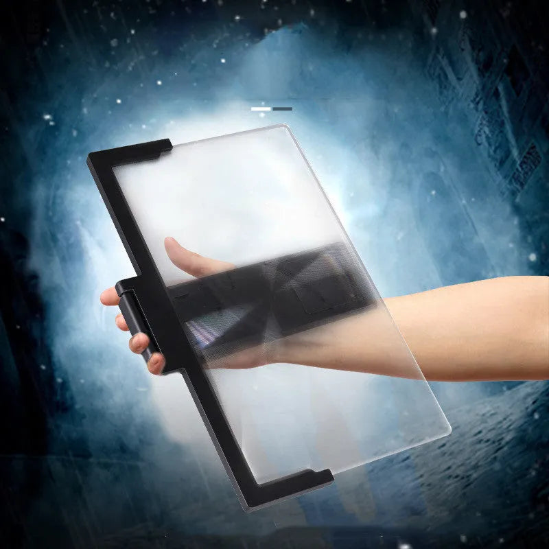 Mobile phone stand magnifier with black frame and clear acrylic screen showing magnification effect