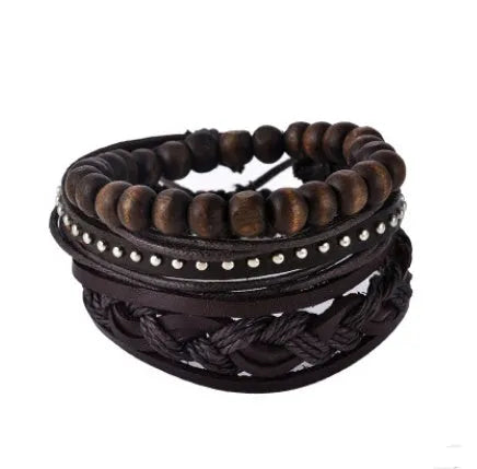 Handmade adjustable leather wrap bracelet with wooden beads on a wrist.