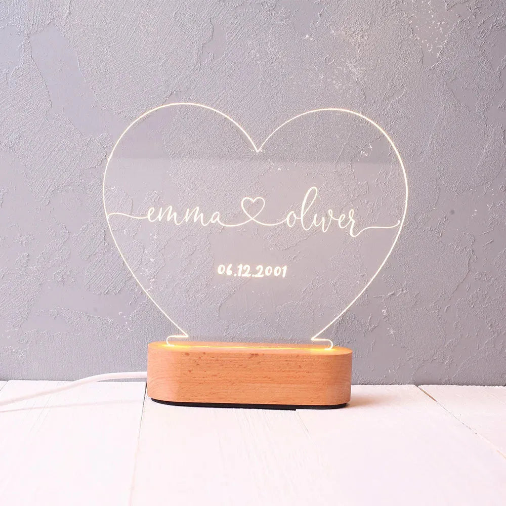 Personalised acrylic night light displaying custom text with USB cable, dimensions 20cm by 11.5cm