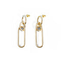 Geometric sterling silver colour hoop earrings with a ring and line design on a white background.
