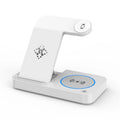 Folding three-in-one wireless charging stand in black with phone, headphones, and watch placed on charging areas