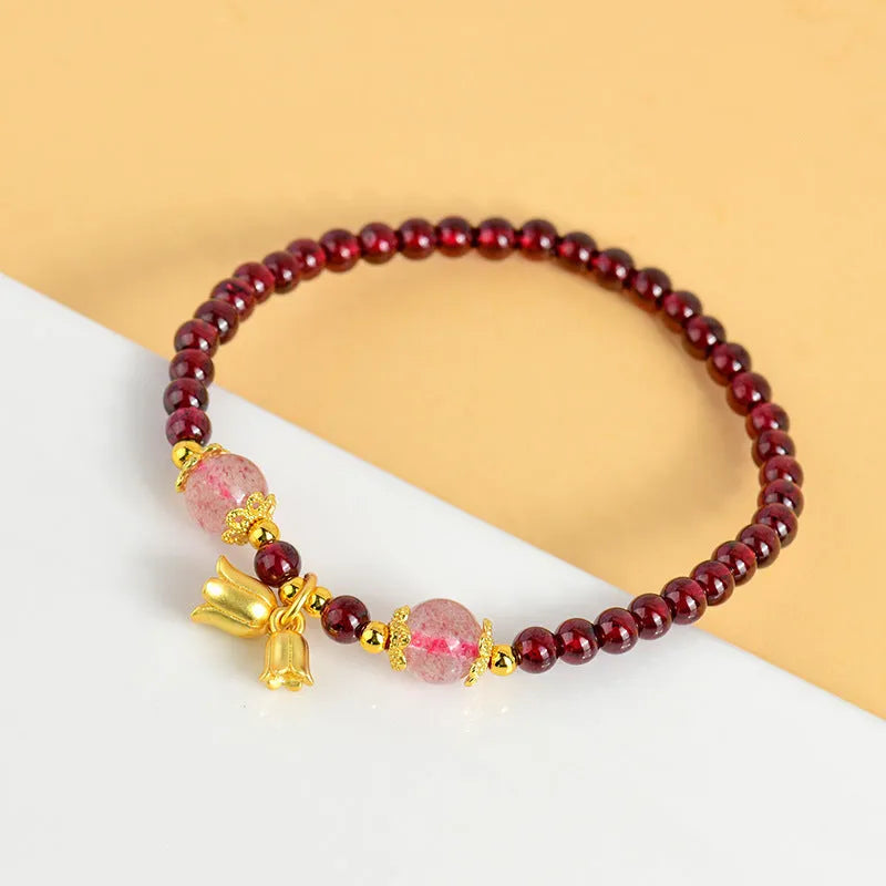 Chinese style gourd bracelet with imitation garnet stones and cultural motifs including Fu character design