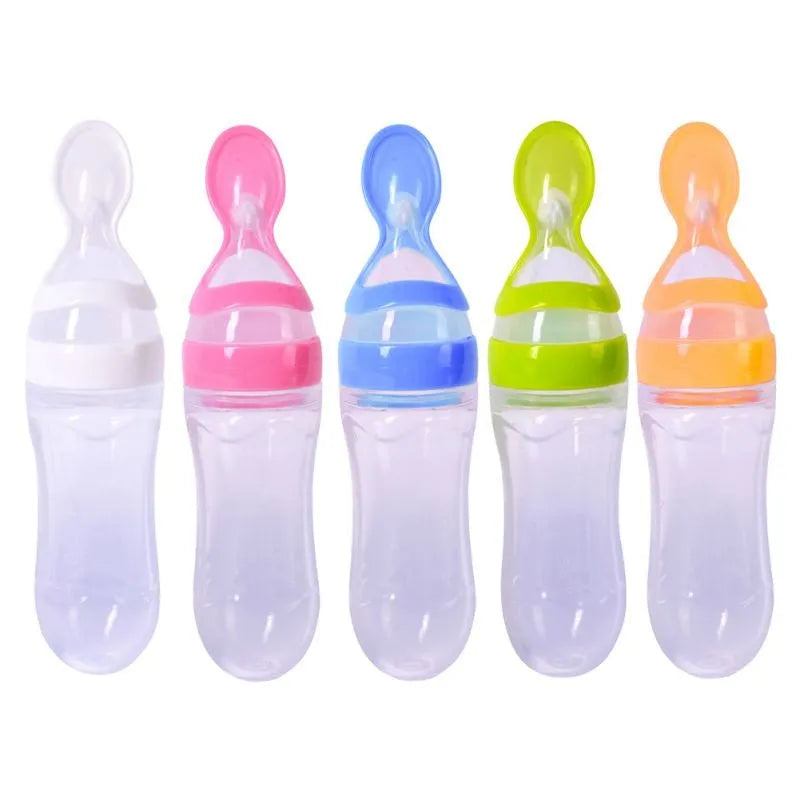 Clear disposable 18 oz paper drinking cup with a blue coloured lid on a table.