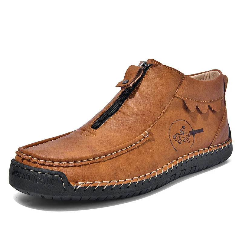 Men's black slip-on loafers with round toe and visible stitching on a rubber sole.