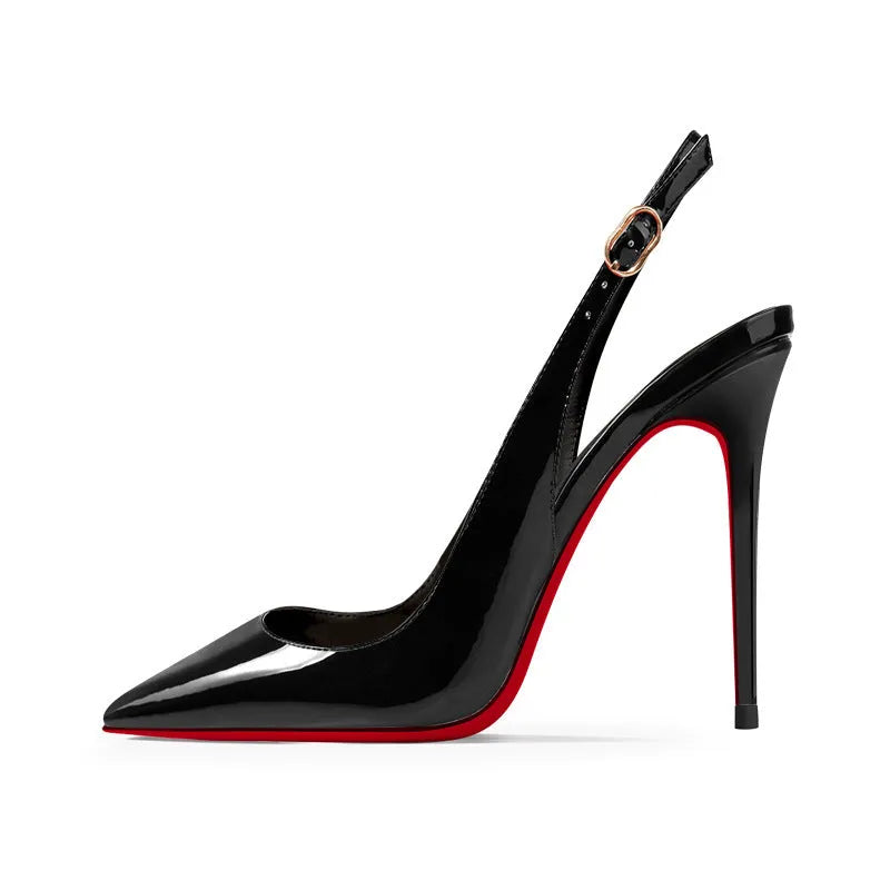 Women's black stiletto heel sandals with an ankle strap buckle and pointed toe on a red background.