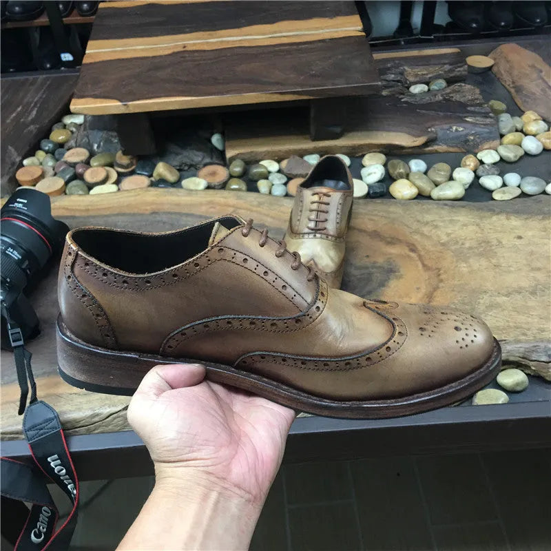 Men's light brown vintage carved leather casual shoes with distressed finish and lace-up design