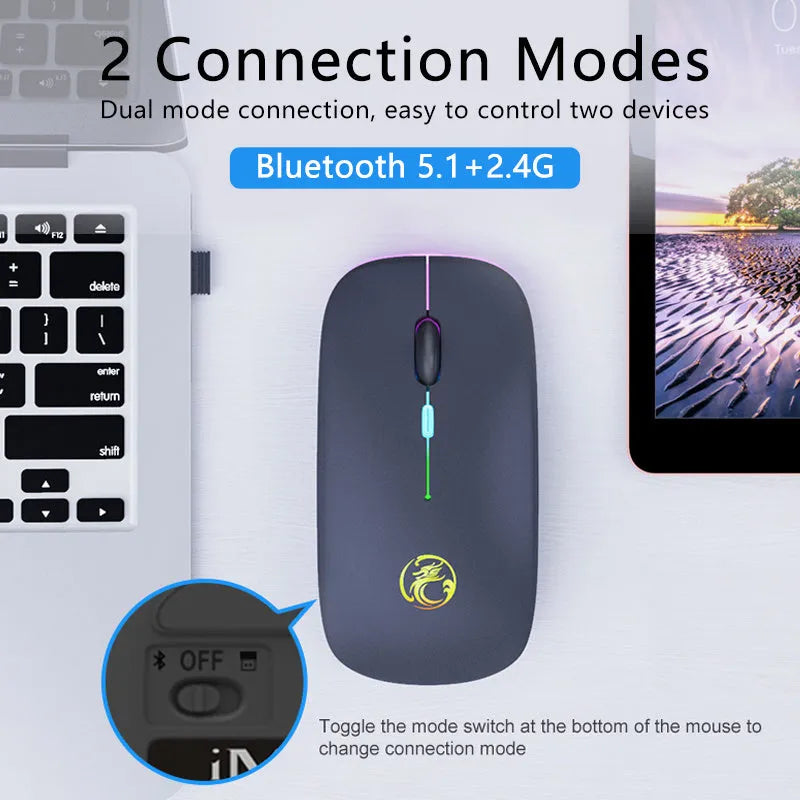 Black and white rechargeable dual-mode wireless mouse with silent buttons on a desk.