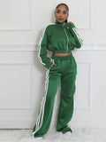 Grey striped men's zipper sweater and trouser two-piece co-ord set on a model.