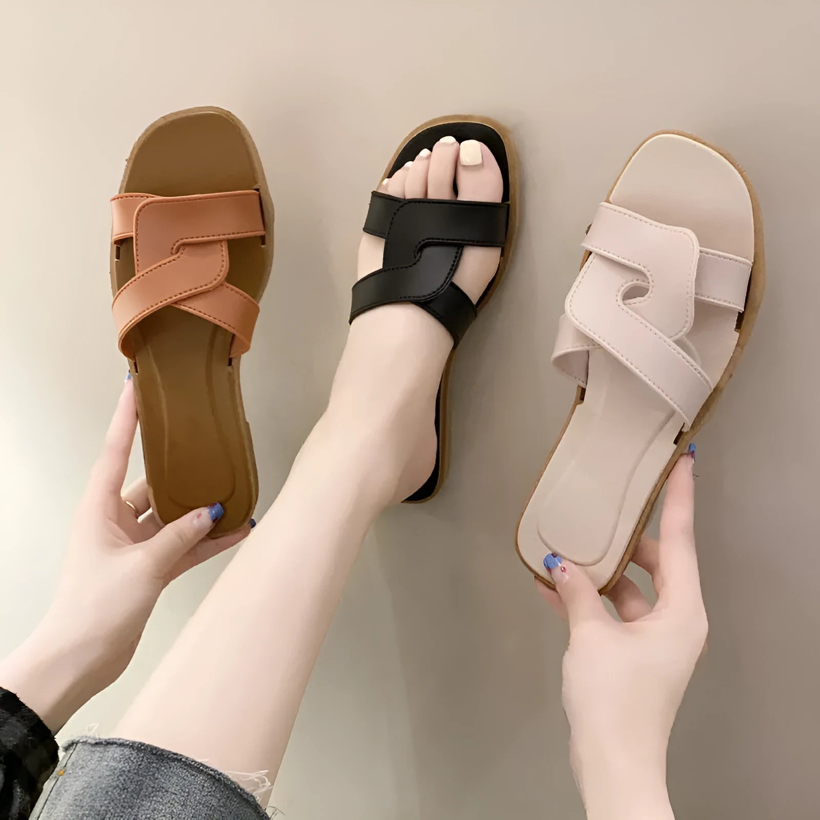 Women's PVC cross strap flip flop sandals in light blue on a white background.