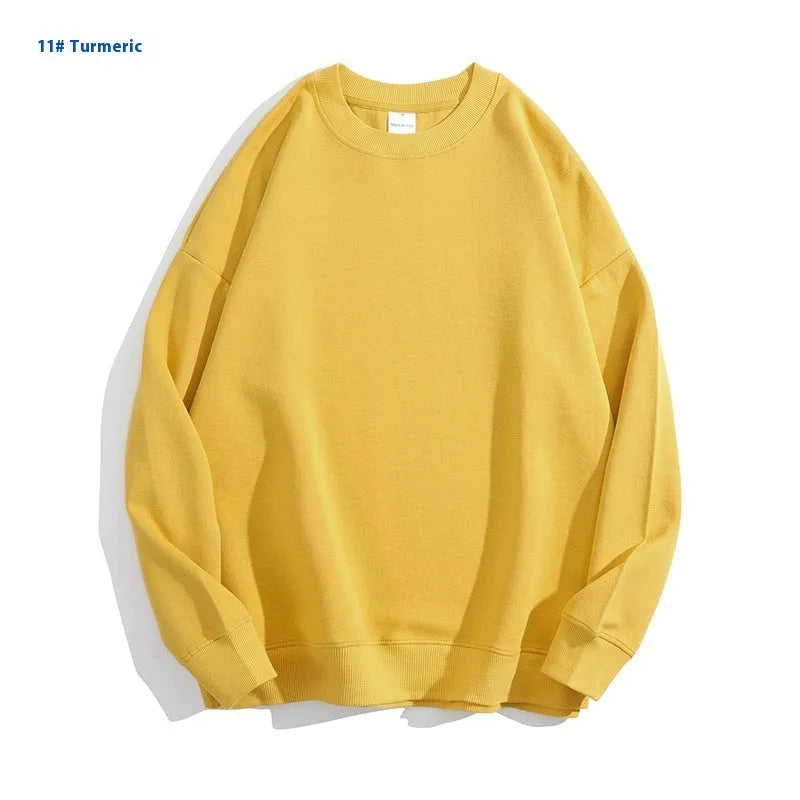 Cotton off shoulder pullover sweater in a loose fit, shown in a solid colour with long sleeves.