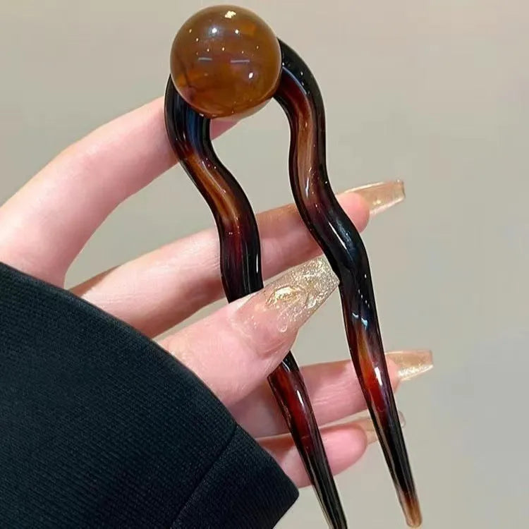 Simple U-shaped acrylic barrettes with ball retro design in beige, caramel, dark gray and green colours