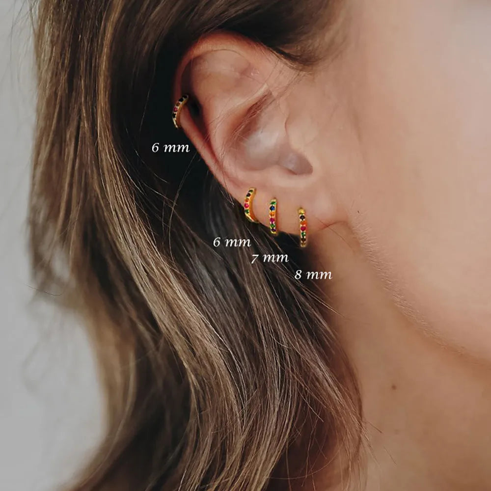 Circle geometric zircon stud earrings in gold, rose gold, and silver colours showing 5mm to 12mm size range