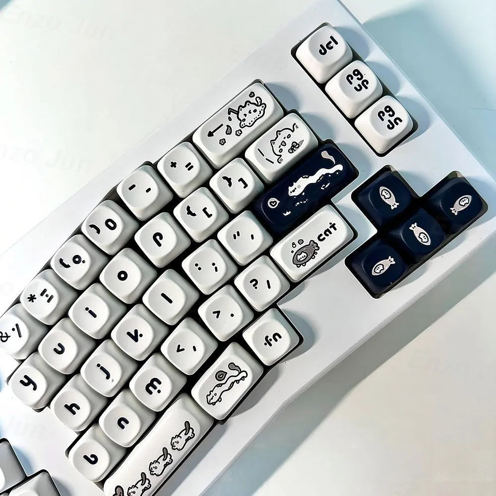 Kitten's Fantasy MOA height key cap set with black and white cat design on white background