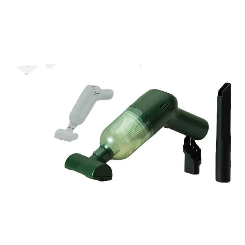 Green electric cat hair cleaner with suction heads for beds