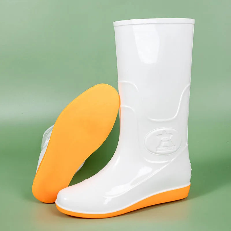 White and yellow plastic washable rain boots with high-tube design and flat heels for labour protection