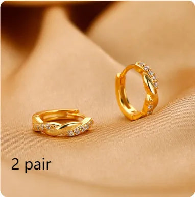 Geometric round copper earclip earrings with hemp rope interwoven design in gold colour