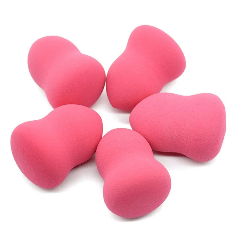 Pink non-latex makeup sponge for foundation application measuring 4x4x5.6 cm