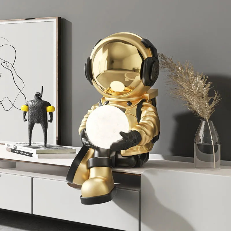 Astronaut night light decoration in gold glass steel on a TV cabinet, 59cm height, modern style
