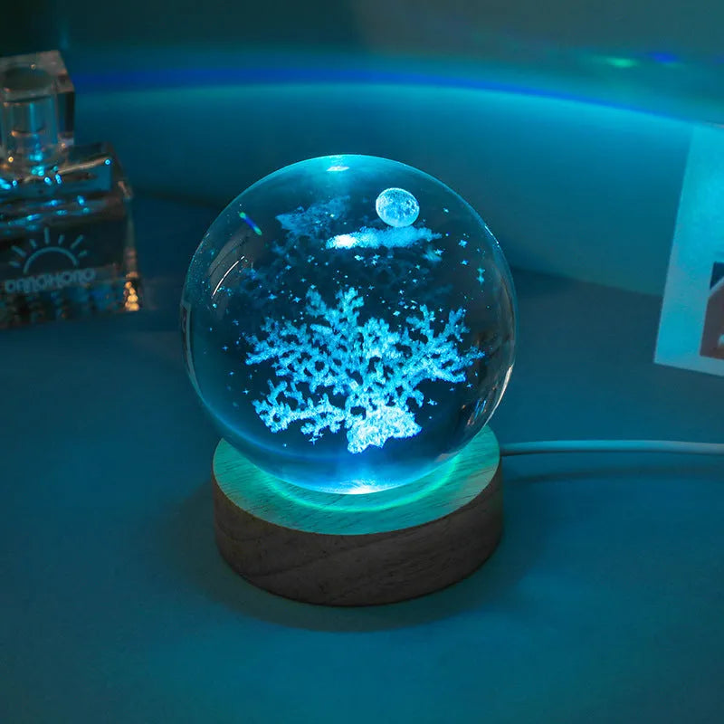 Colorful luminous crystal ball on light wooden base with data cable