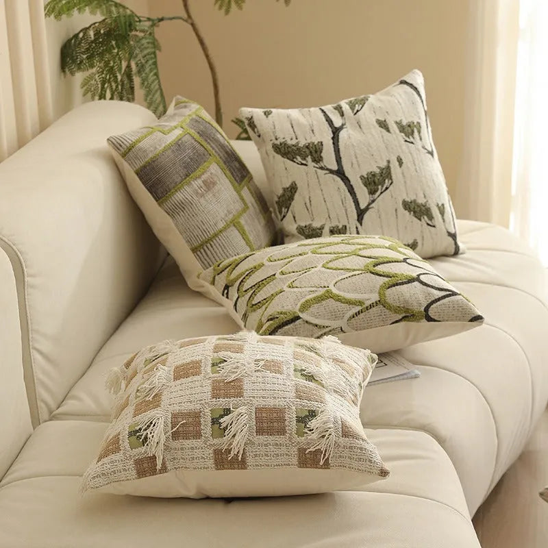 Close-up of a beige and green floral Jacquard woven cushion cover with textured pattern, 45cm square.