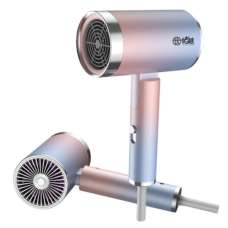 Foldable negative ion hair dryer in emerald green colour with foldable handle and single nozzle